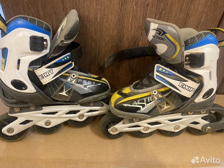 Роликовые коньки