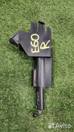 Форсунка омывателя фары правой Toyota Verso R2 20