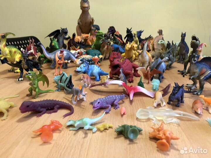 Игрушки динозавры и драконы