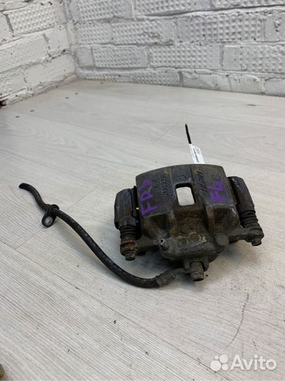 Суппорт тормозной передний левый Honda Civic 4D