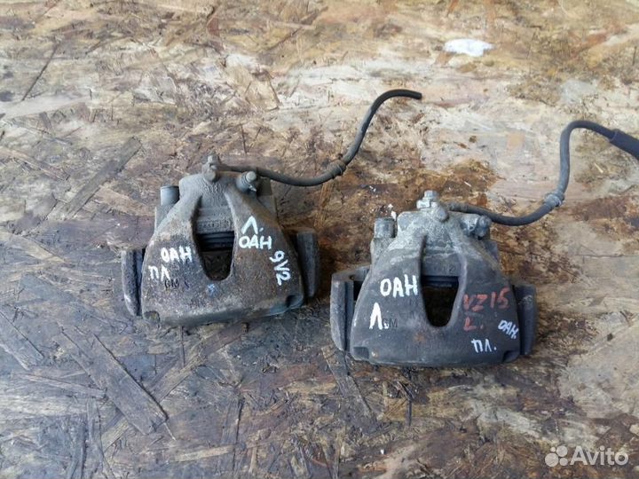 Суппорт передний левый Opel Astra H TwinTop 2004