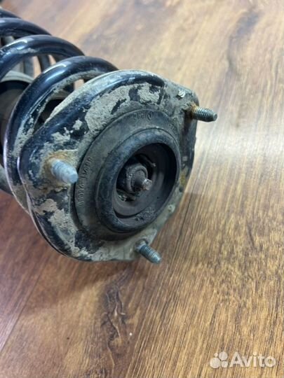 Стойка подвески задняя левая Hyundai Accent