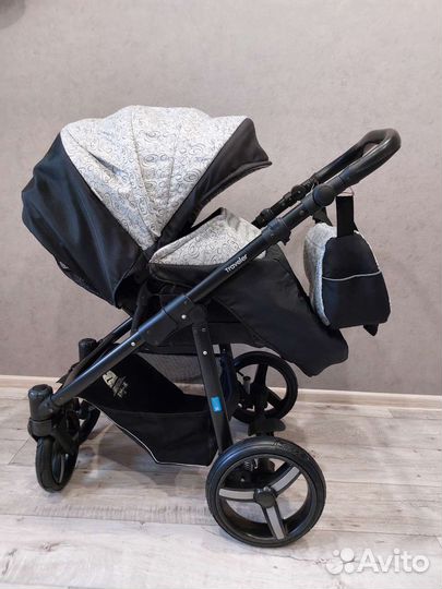 Коляска с реверсивным блоком