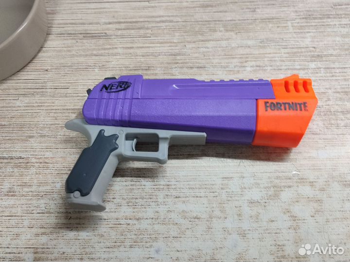 Игрушечный пистолет