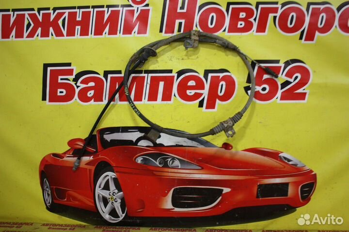 Трос стояночного тормоза левый Mitsubishi Outlande