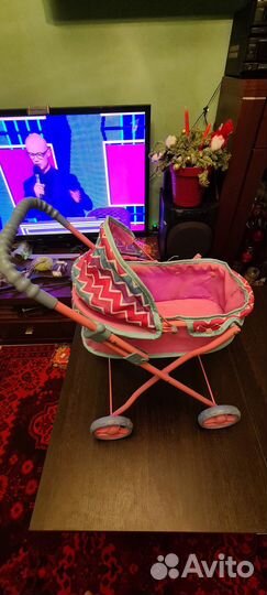 Детская игрушка коляска
