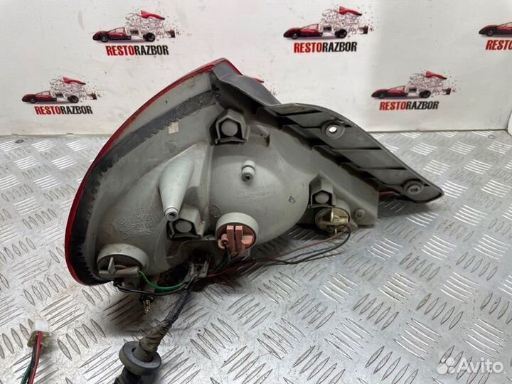 Фонарь задний задний правый Kia Spectra седан S6D