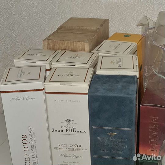 Бутылки и коробки от элитного коньяка