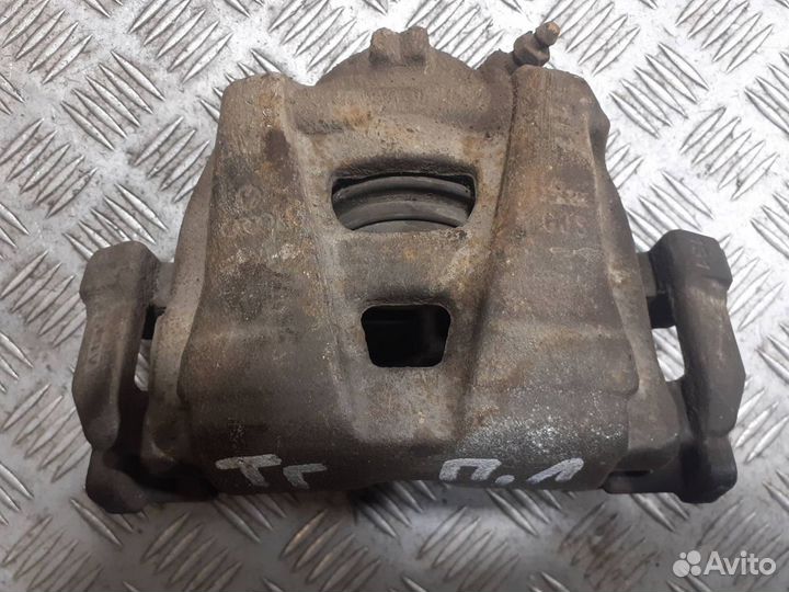 Суппорт передний левый Volkswagen Tiguan