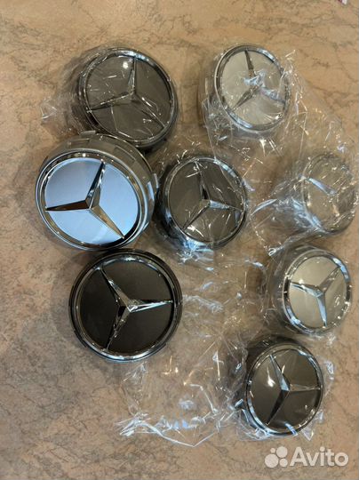 Колпачок ступичный AMG, A0004000900 9790