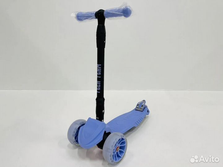 Трехколесный самокат