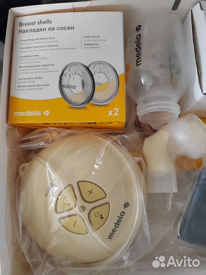 Молокоотсос medela swing электрический