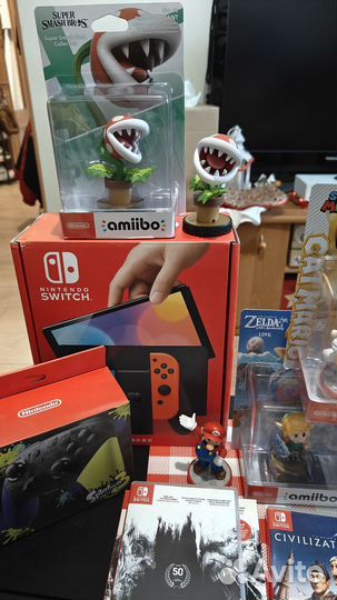 Nintendo Switch Oled+аксессуары+картриджи+амибо