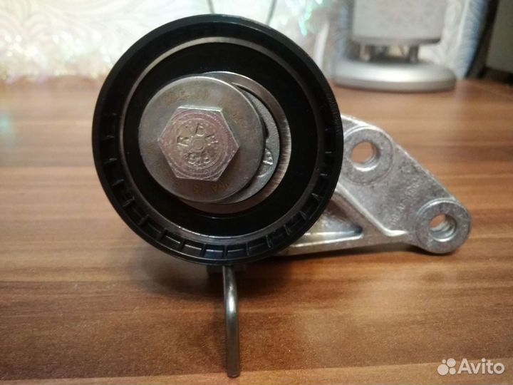 Натяжной ролик грм форд фокус