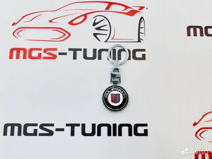 Брелок Alpina металлический круглый