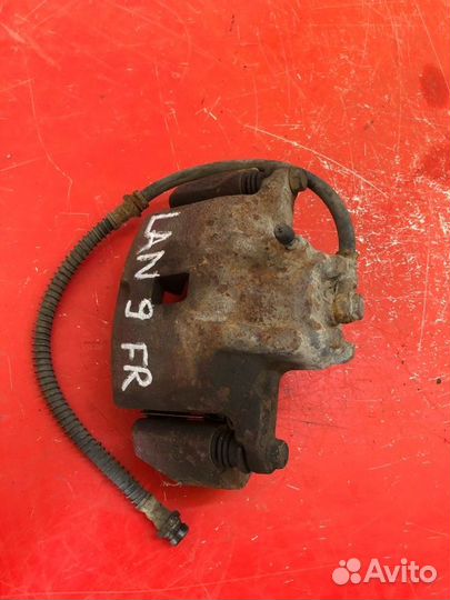 Суппорт тормозной задний правый Mitsubishi Lancer