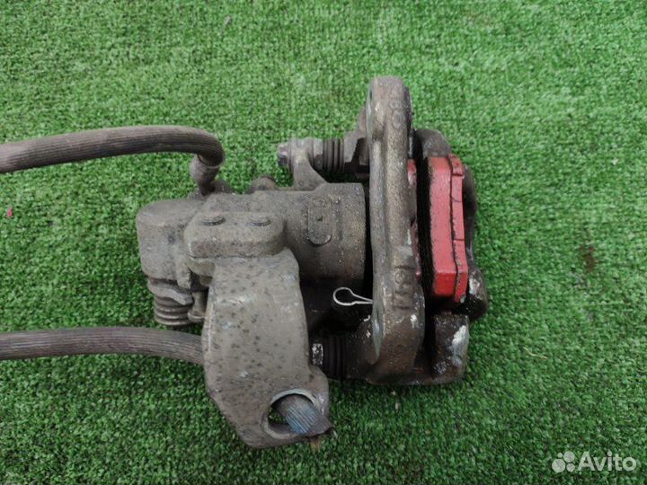 Суппорт задний левый Honda Civic 4D R18A1 2009