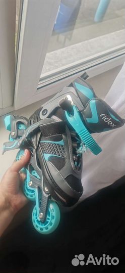 Роликовые коньки