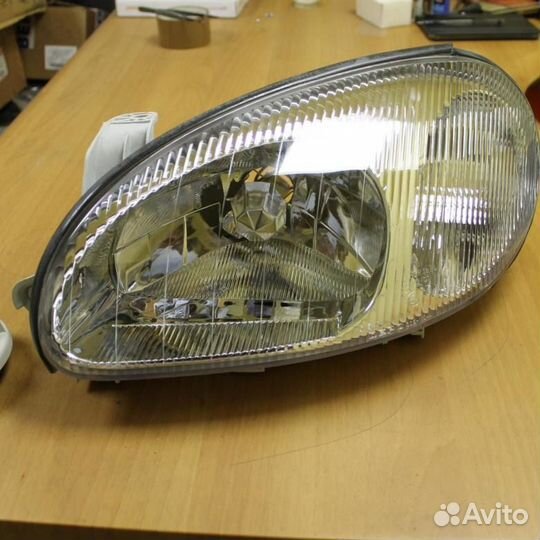 Део Шевроле Ланос фара левая передняя