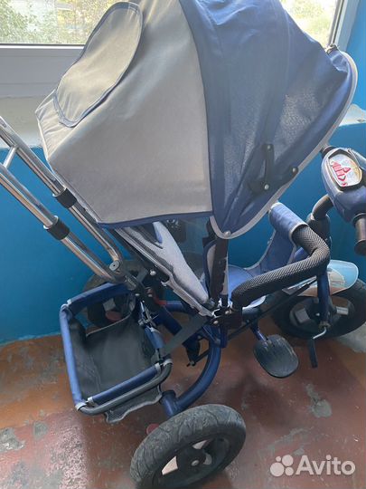 Трехколесный велосипед с ручкой