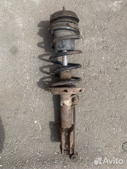 Стойка подвески передняя левая Opel Corsa C