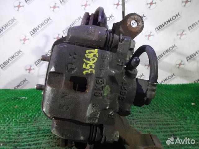 Суппорт subaru BE5 зад лево