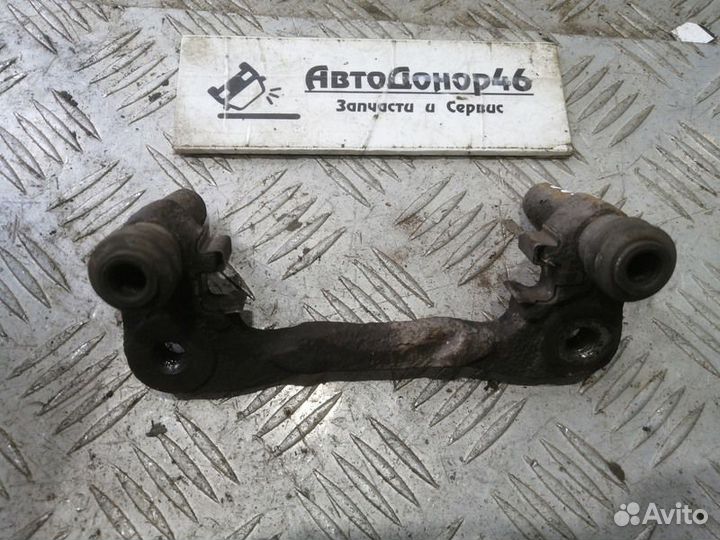 Скоба заднего правого суппорта Mitsubishi Lancer X