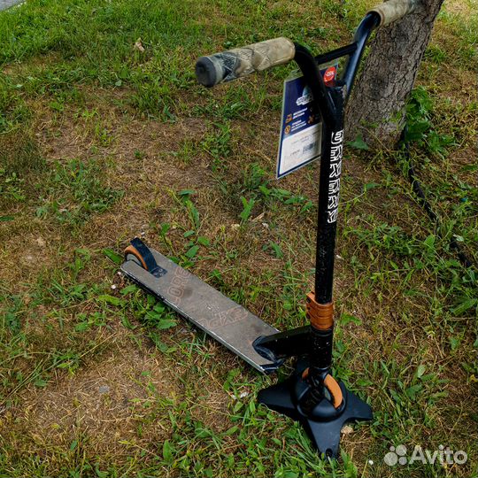 Самокат трюковой с пробегом оранжевый