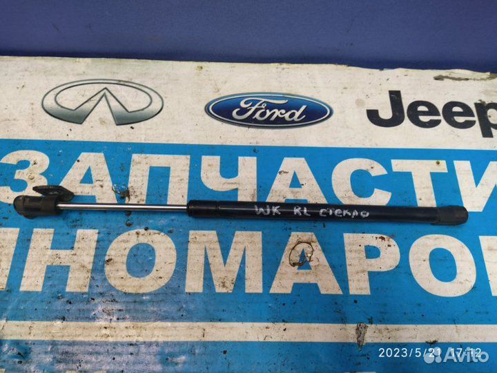 Амортизатор стекла багаж. зад. лев.Jeep Grand Cher