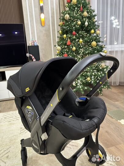 Коляска автокресло doona с базой isofix