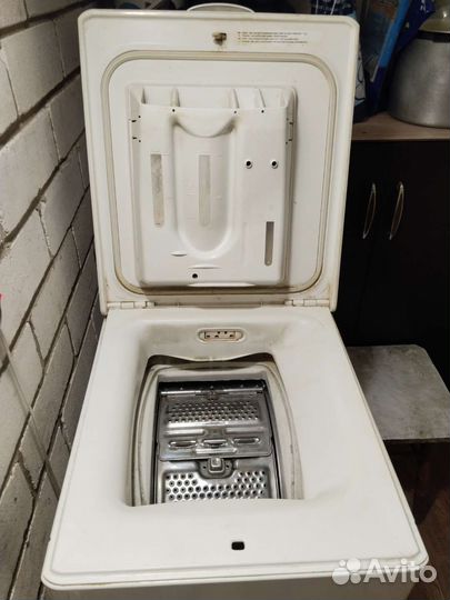 Стиральная машина с вертикальной загрузкой Zanusi