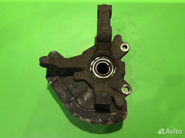 Кулак поворотный левый Fiat Doblo