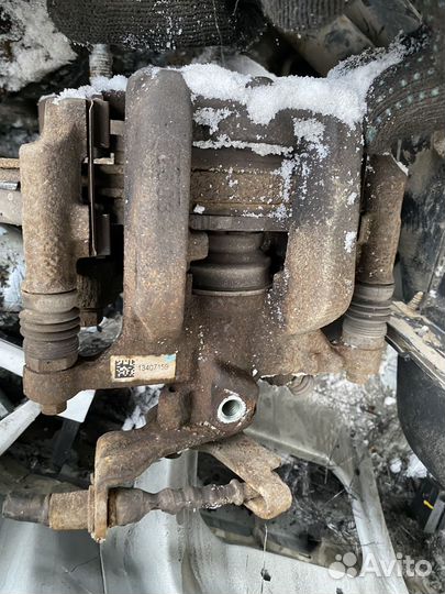 Суппорт тормозной задний левый правый Opel Mokka