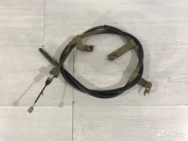 Трос ручника левый hyundai solaris 1 1.6 мт хетчбе