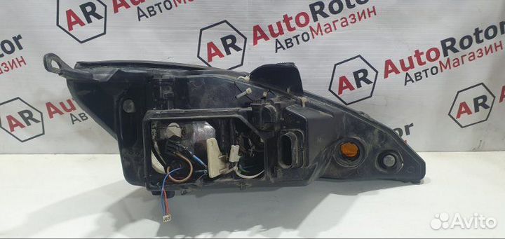 Фара галогеновая левая Ford Focus седан