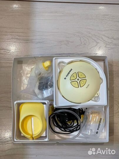 Молокоотсос Medela электрический