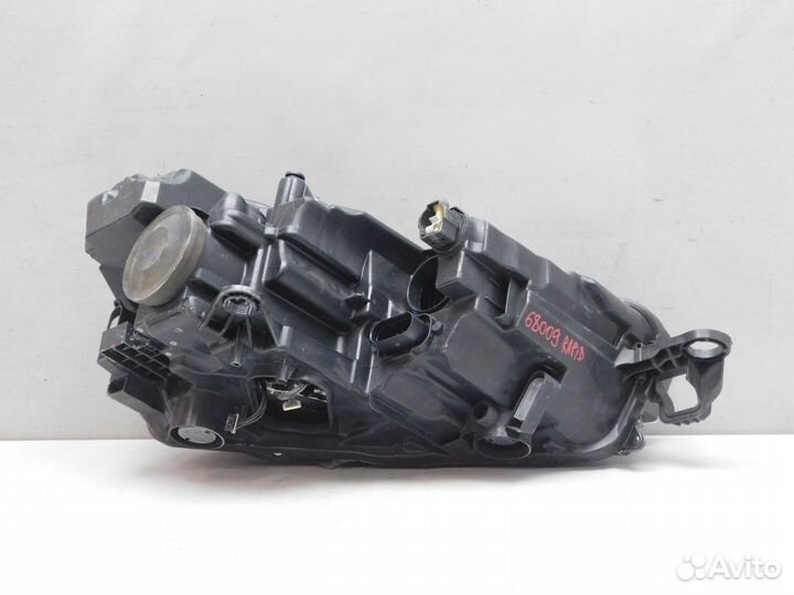 Фара левая Skoda Rapid