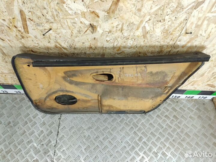 Обшивка двери передней левой Mitsubishi Carisma 20