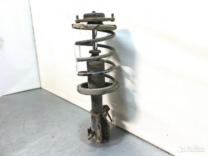 Стойка подвески передняя левая Mazda Familia седан