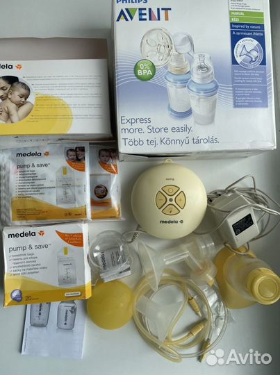 Молокоотсос medela swing