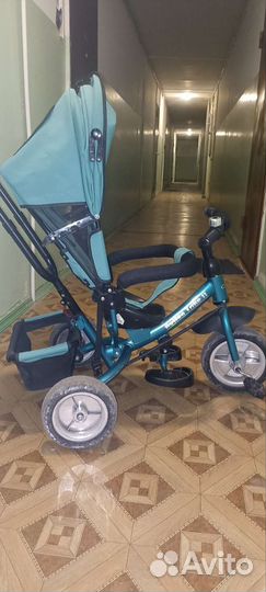 Детский трехколесный велосипед с ручкой