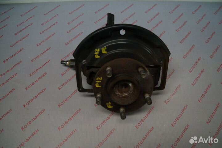 Nissan 40011-AU000 Кулак поворотный левый