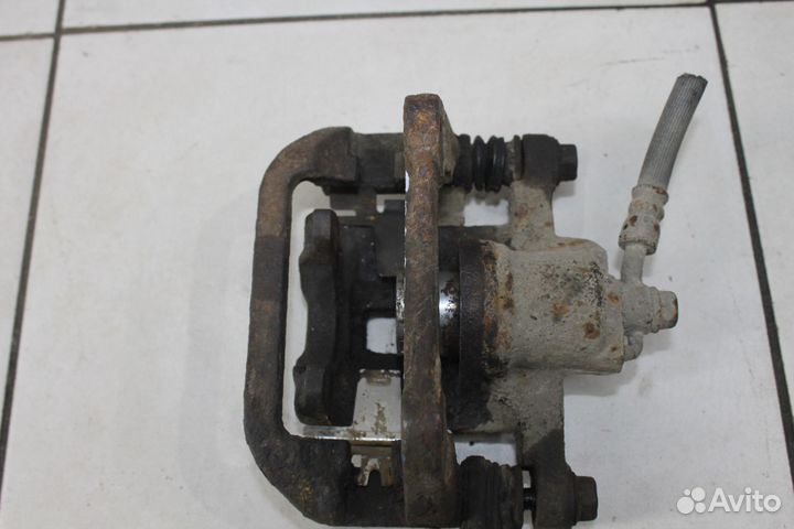 Суппорт тормозной задний Chevrolet Lacetti