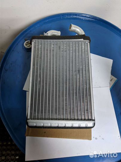 Радиатор отопителя салона печки Nissan UD MK25 FE6