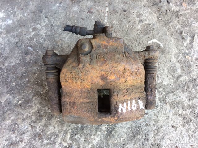 410012F522 Суппорт тормозной передний правый Nissa