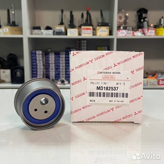 Ролик натяжной грм Mitsubishi 4G63 MD182537