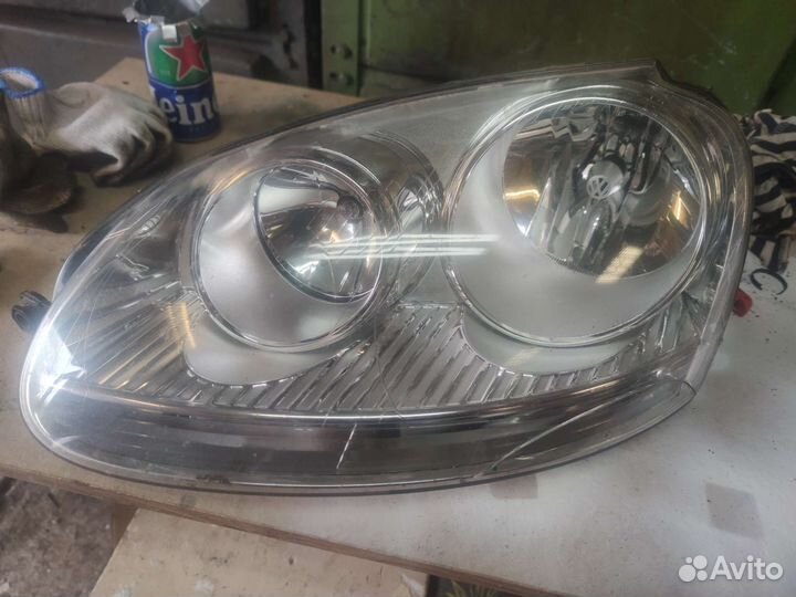 Фара левая vw jetta golf 5