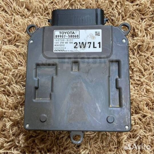 Блок управления фарами передний левый Toyota