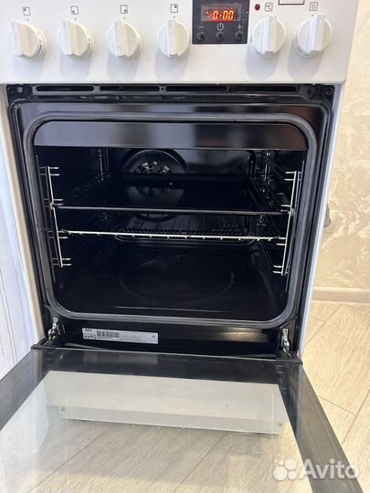 Газовая плита с электрической духовкой AEG