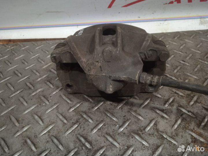 Суппорт тормозной передний правый Renault Scenic 1